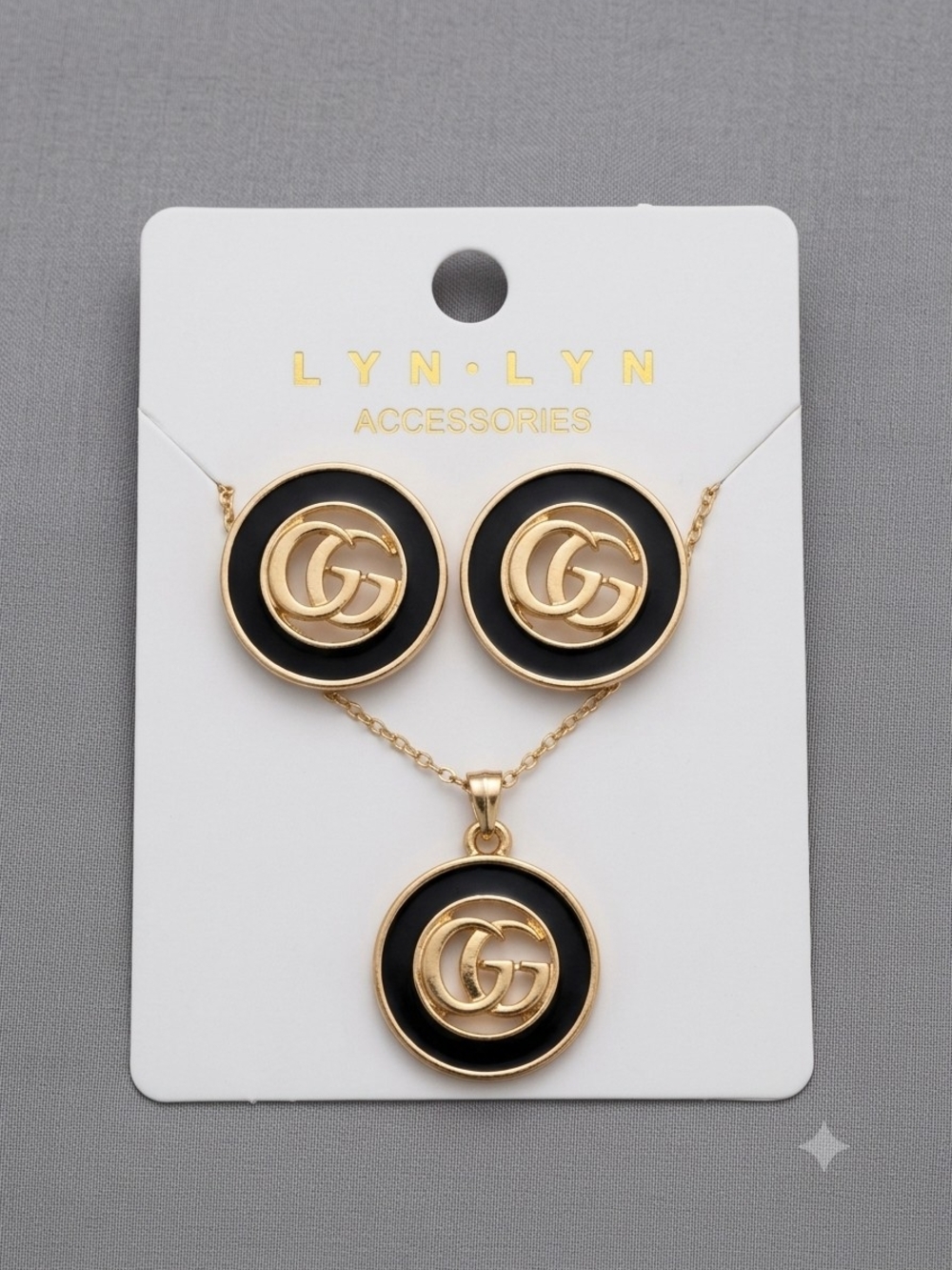 Black and Gold Logo Pendant Necklace & Earring Set